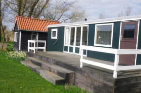 Hoeve Zorglust, salonwagen voor 2 personen met extra slaapkamerhuisje voor 2 - 3 kinderen